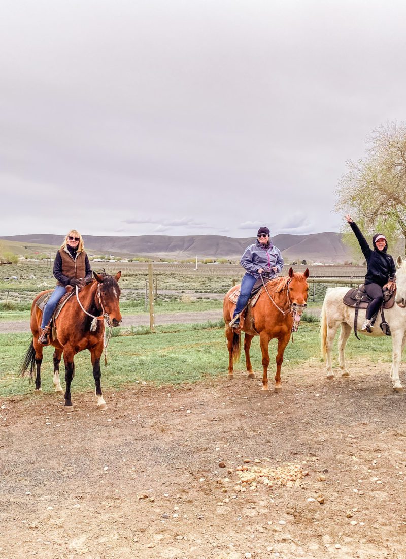 Christine Lozada and Yancy Wright horseback riding in Tri Cities Washington