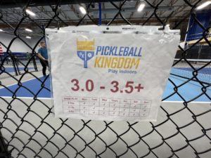 Courts are clearly marked by level during open play 