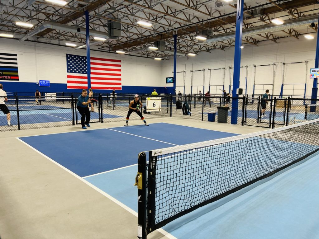 Christine Lozada playing with the locals at Pickleball Kingdom