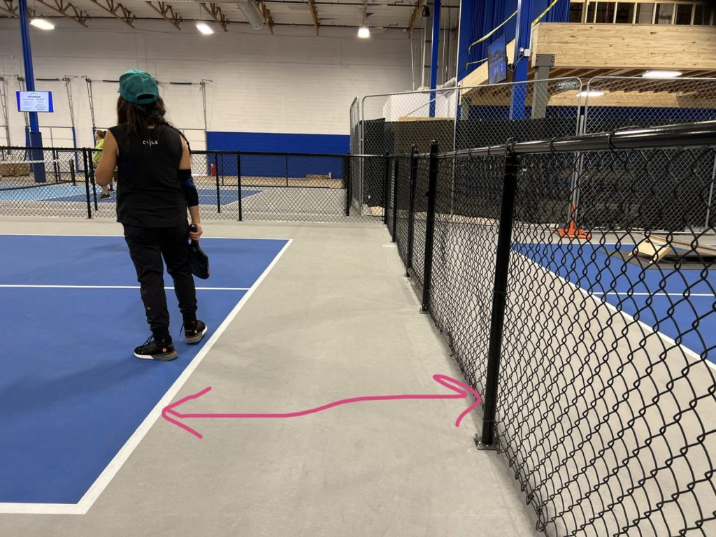 The fences at Pickleball Kingdom can often be too close to the court causing disruption to play