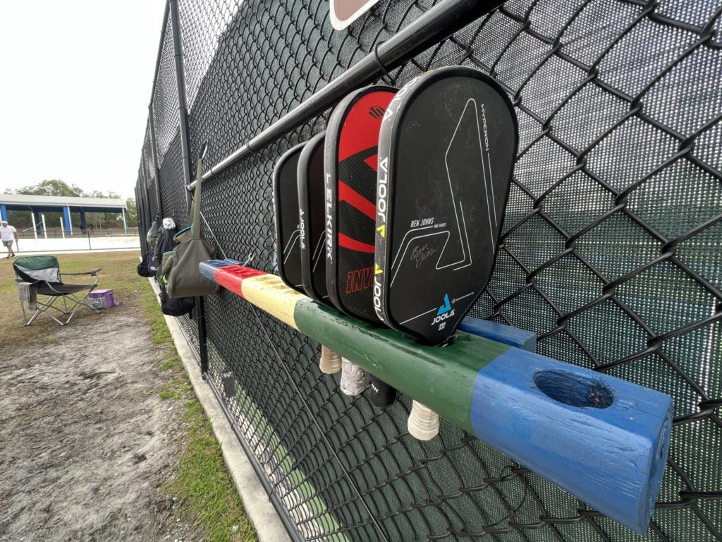 Pickleball paddle lineup at Winterlakes Park