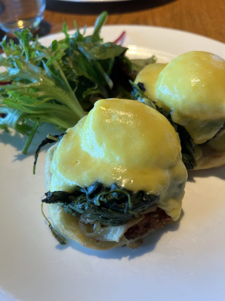 Pork Belly Benedict on Virgin Voyages Scarlet Lady The Wake